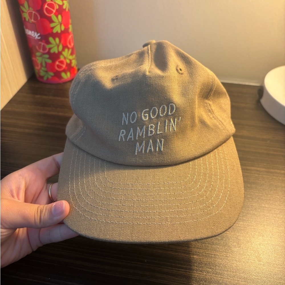 Zach Bryan Tan Baseball Cap with Embroidered Text “No good ramblin’ man”